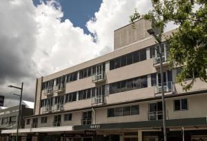 a large building with windows on the side of it at Quest On Ward Serviced Apartments in Hamilton