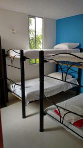 En eller flere senge i et værelse på Flandes vallesue