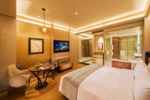 Voodi või voodid majutusasutuse MGM Cotai toas