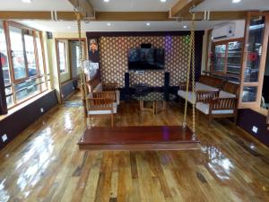 Posezení v ubytování Kerala Nature Houseboat by Coco floatel