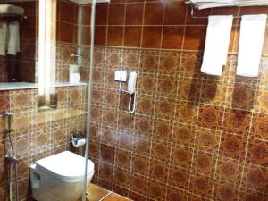 Koupelna v ubytování Hotel Oxina Lygon