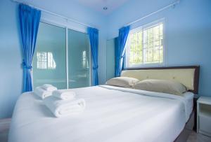 Xaiyong Resort - ไทรโยงรีสอร์ท客房内的一张或多张床位