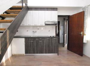 Kuchyň nebo kuchyňský kout v ubytování Apartments Dragana 1508 + 37 fotografií