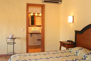 Cama o camas de una habitación en Finca Son Guardiola