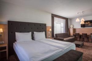 Postelja oz. postelje v sobi nastanitve Hotel Galatea