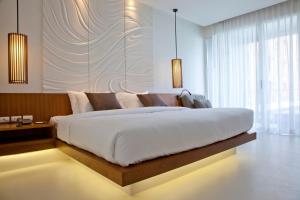 Postel nebo postele na pokoji v ubytování G Hua Hin Resort & Mall + 37 fotografií