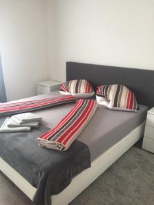 Postel nebo postele na pokoji v ubytování Augsburger Apartment