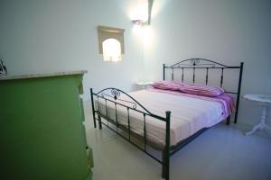 Postel nebo postele na pokoji v ubytování Villa Le Macchie