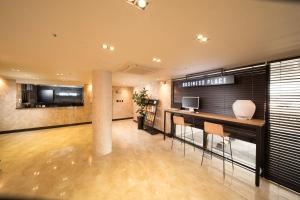 Kuchyň nebo kuchyňský kout v ubytování Pino Hotel