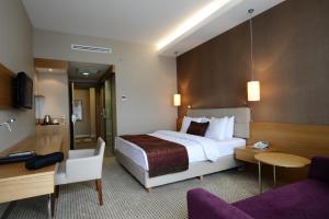 Ramada by Wyndham Podgorica客房内的一张或多张床位
