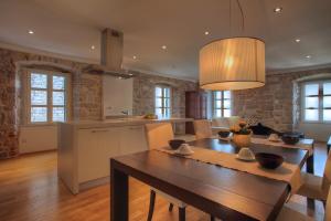 Η κουζίνα ή μικρή κουζίνα στο Casa Marina Apartments