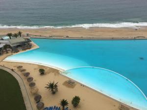 Vista de la piscina de Duplex Jacuzzi San Alfonso del Mar o alrededores