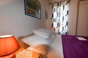 Postel nebo postele na pokoji v ubytování Apartment Petrlin