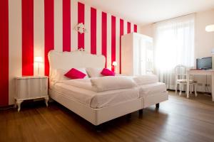 Postel nebo postele na pokoji v ubytování Hotel Speranza