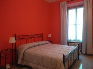 Postel nebo postele na pokoji v ubytování Villa Lorenzo