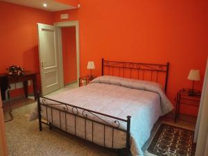 Postel nebo postele na pokoji v ubytování Villa Lorenzo