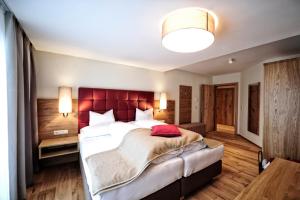 Postelja oz. postelje v sobi nastanitve Hotel Dorfstadl