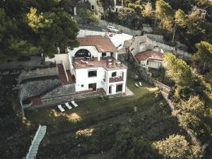 an aerial view of a house on a hill at Villa Crawford in San Nicola Arcella
