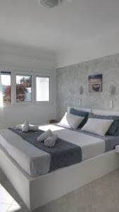 Postel nebo postele na pokoji v ubytování Lagada Beach Hotel + 37 fotografií