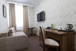 TV a/nebo společenská místnost v ubytování West Park Hotel
