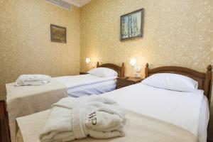 Postel nebo postele na pokoji v ubytování West Park Hotel