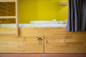 Postel nebo postele na pokoji v ubytování SAHIL Hostel & Hotel