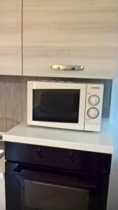 Kuchyň nebo kuchyňský kout v ubytování ACERO ROSSO B&B in Franciacorta + 18 fotografií