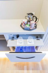 Coffee and tea making facilities at 200 ROOMS & TERRACE