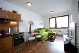 Kjøkken eller kjøkkenkrok på Apartments Ski & Sun