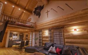 Posezení v ubytování Holzhaus Lugerhof