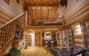 Posezení v ubytování Holzhaus Lugerhof