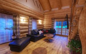 Posezení v ubytování Holzhaus Lugerhof