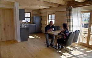 Posezení v ubytování Holzhaus Lugerhof