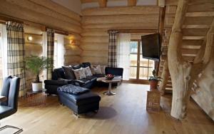 Posezení v ubytování Holzhaus Lugerhof