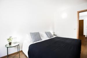 Postel nebo postele na pokoji v ubytování Font del Ferro Apartments