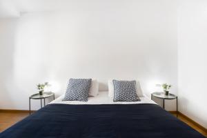 Postel nebo postele na pokoji v ubytování Font del Ferro Apartments