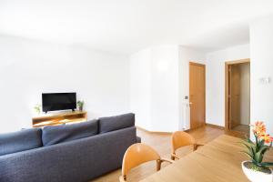 TV a/nebo společenská místnost v ubytování Font del Ferro Apartments