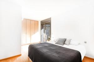 Postel nebo postele na pokoji v ubytování Font del Ferro Apartments
