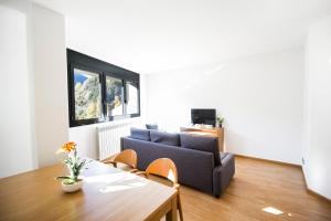 TV a/nebo společenská místnost v ubytování Font del Ferro Apartments