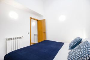 Postel nebo postele na pokoji v ubytování Font del Ferro Apartments