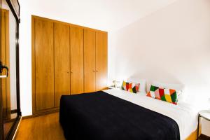 Postel nebo postele na pokoji v ubytování Font del Ferro Apartments