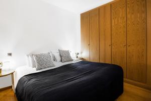 Postel nebo postele na pokoji v ubytování Font del Ferro Apartments
