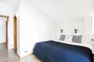 Postel nebo postele na pokoji v ubytování Font del Ferro Apartments