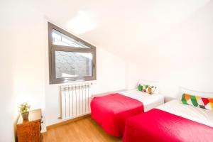 Postel nebo postele na pokoji v ubytování Font del Ferro Apartments