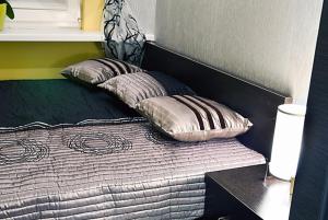 Posteľ alebo postele v izbe v ubytovaní Apartament Kryształowy