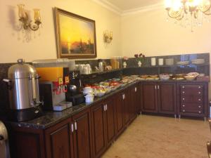 a kitchen filled with lots of counter top space at Sultan Palace Hotel in Istanbul