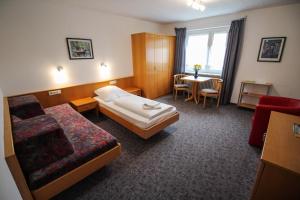 Postel nebo postele na pokoji v ubytování Hotel Relax