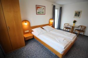 Postel nebo postele na pokoji v ubytování Hotel Relax