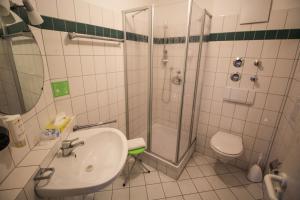 Koupelna v ubytování Hotel Relax