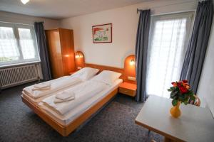 Postel nebo postele na pokoji v ubytování Hotel Relax
